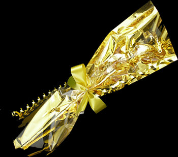 A Single 24kt Gold dipped Rose wrapped in gold cellophame and bow!